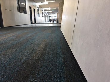 Commercial hallway with sustainable carpet interior