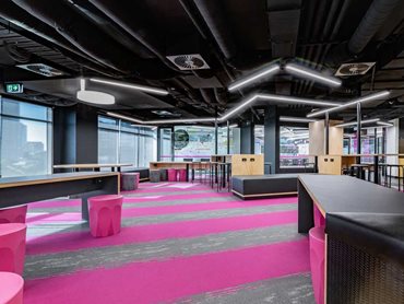 Carpet tiles were chosen in a vibrant magenta to reflect Haileybury’s corporate colours