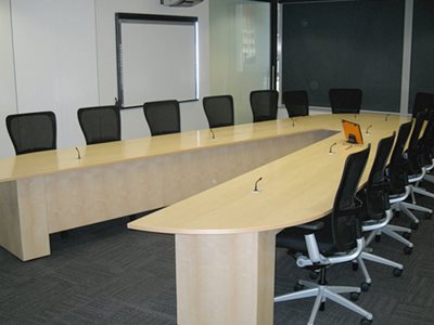 Integrated boardroom display screens and technology