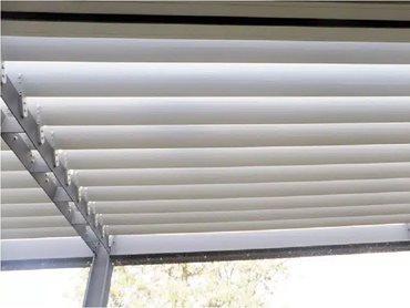 The adjustable blades in the louvres allow users to control the amount of natural light entering the room