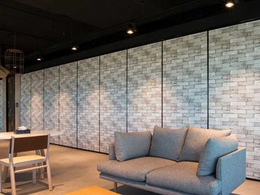 The acoustic operable walls feature high end finishes to complement the premium quality of the office