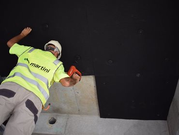  Martini Absorb HD Black being installed to the concrete soffit