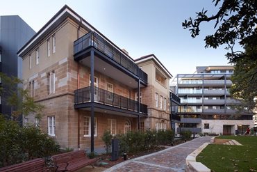 Apartments spill out onto a central courtyard where Caritas House, Gatekeeper’s Cottage and communal landscaped areas feature. 