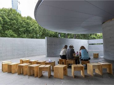 The design features a large canopy formed of a 14.4-metre aluminium-clad disc resting on a central column