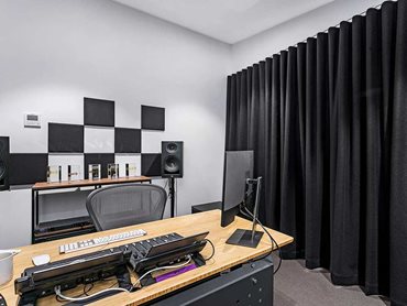 Acoustic blinds and curtains utilise raw materials and fabric construction designed for sound absorption