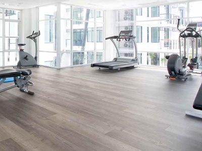 Gym interior with luxury vinyl tile planks
