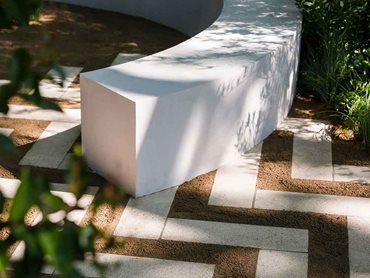 Anston herringbone paving draws bold lines in the flooring of the outdoor contemplative space