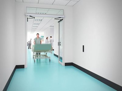 Assa Abloy SW300 Interior Of Hospital Corridor With Swing Door System