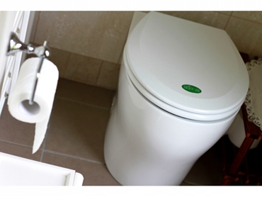 Waterless composting toilets by ECOFLO Water Management l jpg