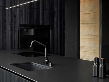 This kitchen is given absolute clarity with one colour and two materials