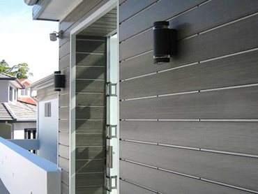 The flat joint concealed fixing system connects two boards together with aluminium clips to give a uniform 1mm shadow line between the cladding boards