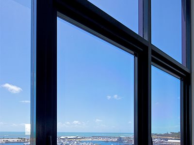Alspec ThermAFrame® 101.6mm Centre Glazed Thermally Broken Framing Interior Window Frame Overlooking Harbour