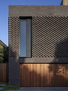 dark brick extruded pattern residentail house
