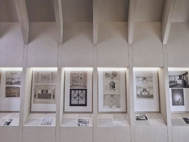 The Asplund Pavilion was designed to house a temporary exhibition of original drawings by Gunnar Asplund for the Woodland Chapel
