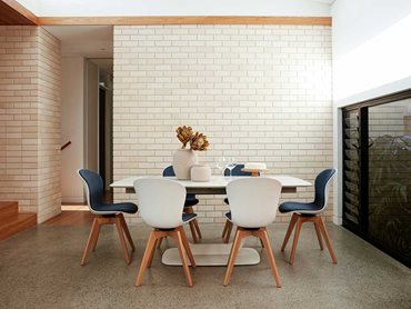 The Eames-inspired Adelaide dining chairs with the sleek Alicante table
