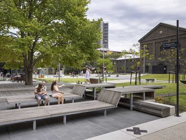 Hand-carved bluestone blocks have been reused to create seating in the Piazza