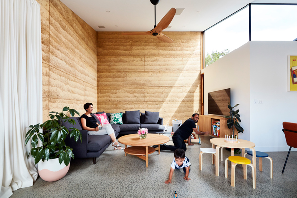 rammed earth extension living room