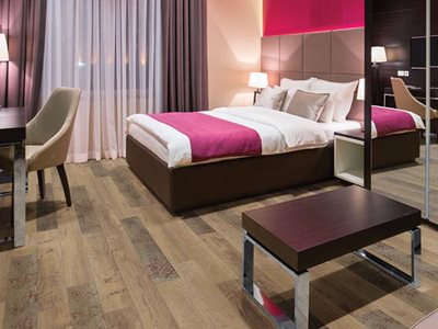 Bedroom interior with luxury vinyl tile planks