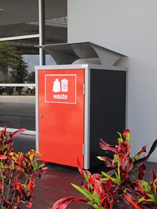BinSafe Opera red bin enclosure in outdoor setting