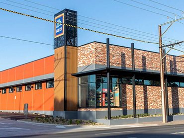 The brick and timber-look cladding finish was chosen to soften ALDI Norwood's street presence and add character