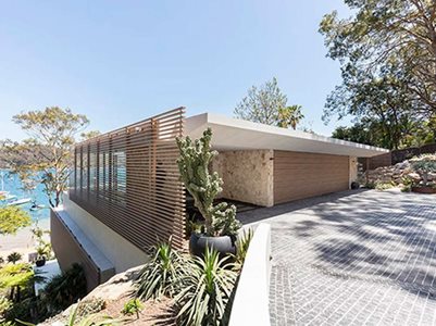 Covet Modern House Overlooking Water Featuring Timber Look Cladding