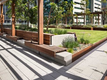 Custom exposed aggregate paving by Anston Architectural at Skypark, Melbourne Quarter