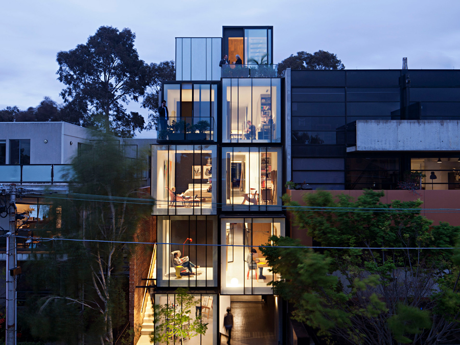 multi-generational mixed-use house exterior night