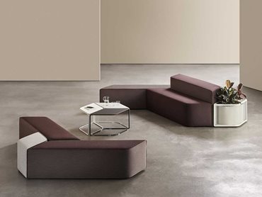 The Tesserae collection includes upholstered seating in a range of lengths, and matching upholstered backrest elements