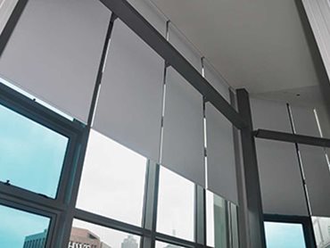 Ambience roller blinds in white 205 SilverScreen semi-transparent fabric were supplied for the penthouse 