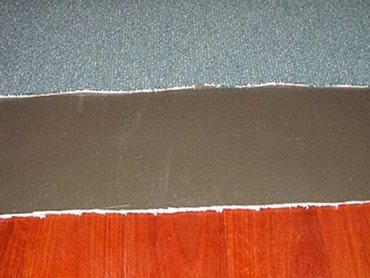 Acoustic carpet underlay on timber floor