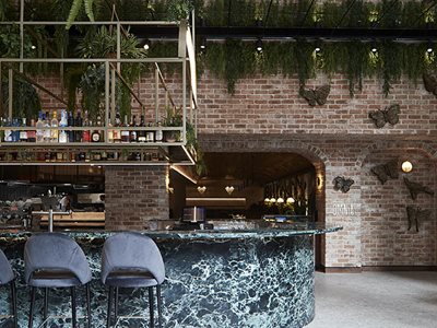 commercial bar reclaimed brick green folliage