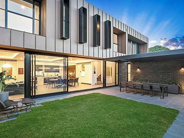 Brick, concrete and aluminium combine to create a stunning home