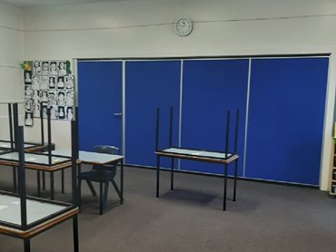 Bildspec's operable walls allow both classrooms to operate simultaneously without unwanted sound transmission between the two spaces