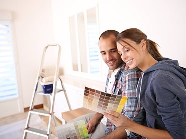 Couple Selecting Paint Samples
