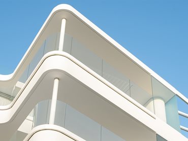 The glass balustrades provide unobstructed views to the immediate environment and beyond