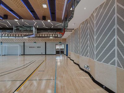Sports centre interior with perforated panels