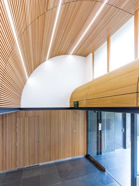 SUPASLAT timber slats create a directional flow through the new glass doors
