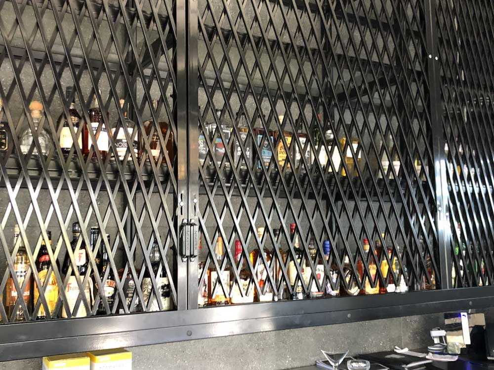 The barrier at Thynk Café encloses the whiskey cabinet