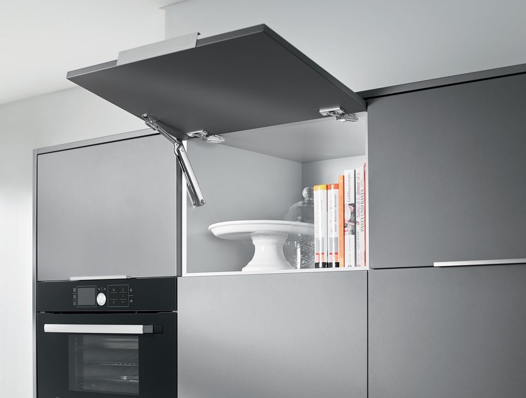 The AVENTOS HK-XS stay lift offers a high level of design freedom with different front thicknesses easily integrated. 