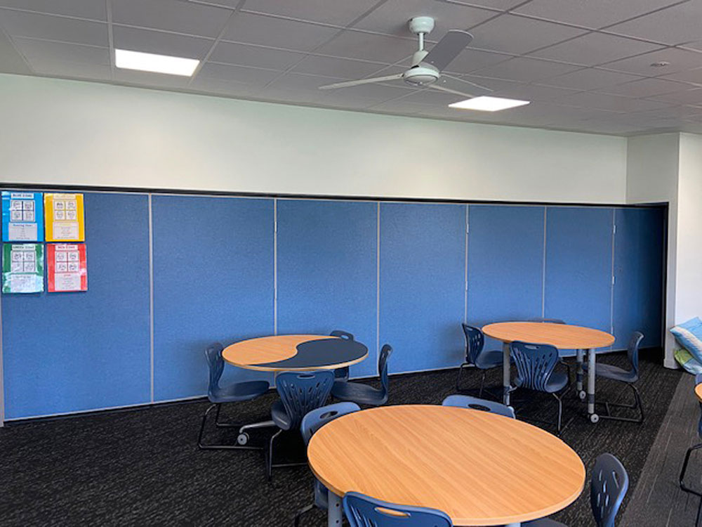 Bildspec's acoustic walls turned four large areas into eight smaller learning spaces
