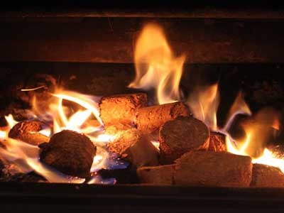 All sawdust and off cuts are compressed into wood briquettes to fuel a hydronic heating system