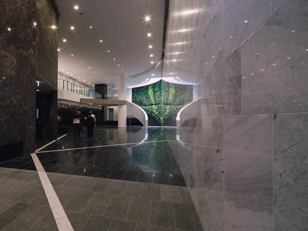 The lift lobby at the Brisbane office tower featuring finished stone
