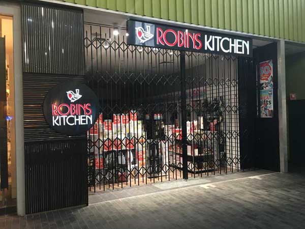A Robin&rsquo;s Kitchen store featuring ATDC&rsquo;s concertina security door
