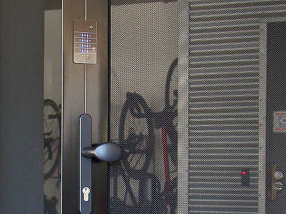 Crimsafe iQ mesh security door with electronic access