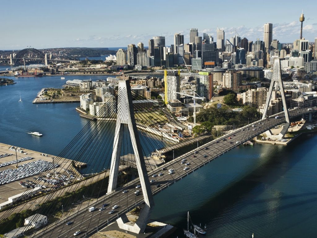 Much of the traffic using Sydney&#39;s Anzac Bridge, and in the distance, Harbour Bridge is travelling through the city centre, not to it or from it. Image: Concrete Playground&nbsp;
