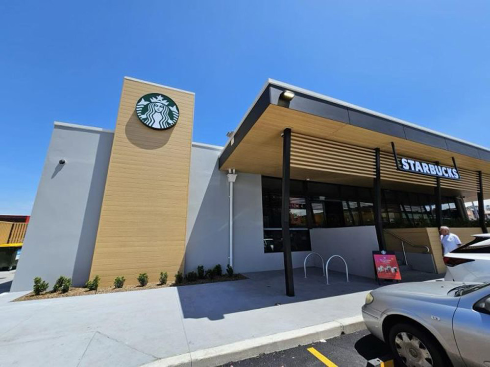 The new Starbucks cafe in Warrawong features WoodEx cladding and batten profile