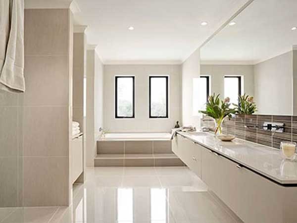 One of the recent trends in bathroom design is to install large format tiles
