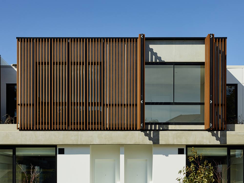 Exterior facade image of residential building with wood plastic cladding